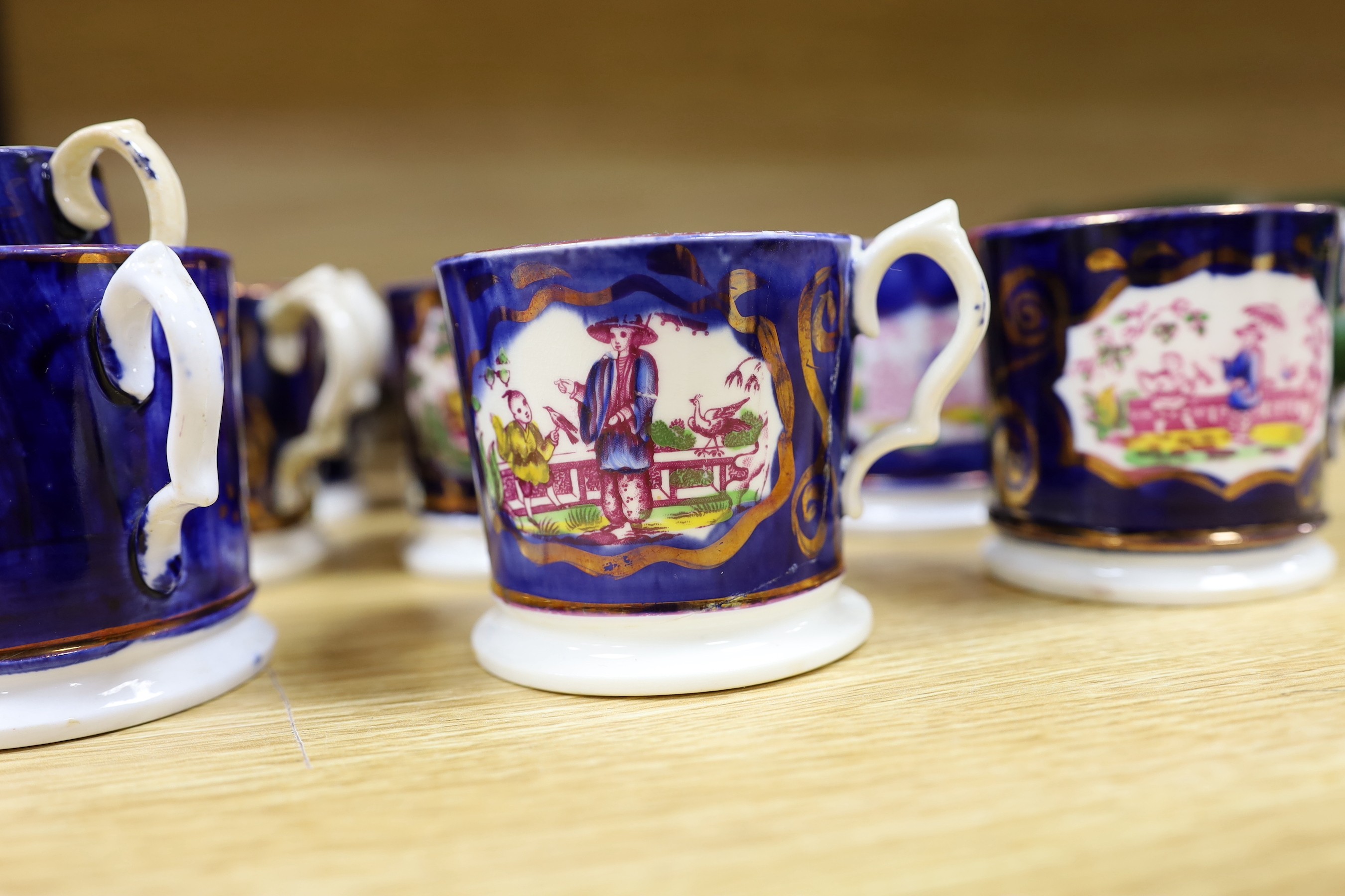 A quantity of Gaudy Welsh lustre cups with chinoiserie motifs, approx 40, varying in size